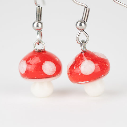 Handmade red mushroom glass earrings by mmmelty