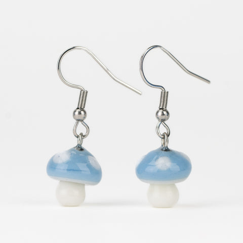 Fun UV-reactive glass mushroom earrings for girls