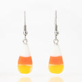 A pair of two candy corn designed glass earrings for Halloween