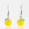 Handmade lemon slice glass earrings by Mmmelty