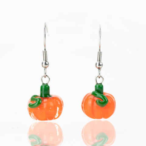 A pair of two pumpkin shaped glass earrings for Halloween