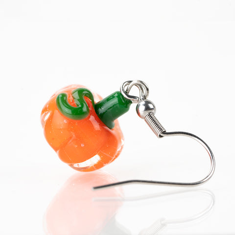 Glass pumpkin earrings perfect for Halloween and autumn outfits