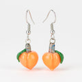Handmade peach glass earrings by Mmmelty