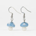 Fun UV-reactive glass mushroom earrings for girls